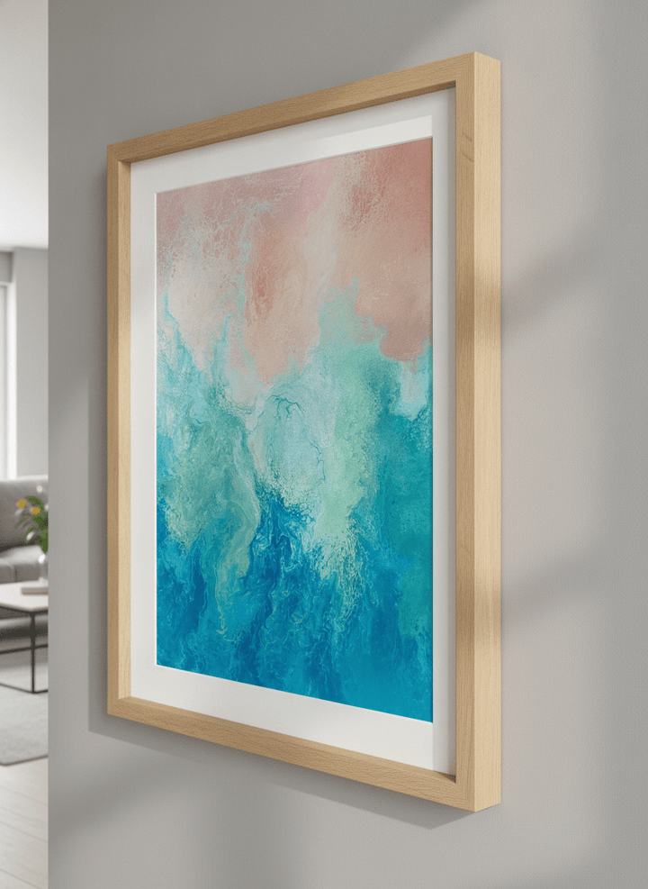 Modern wall art styled above a sofa in a neutral living room