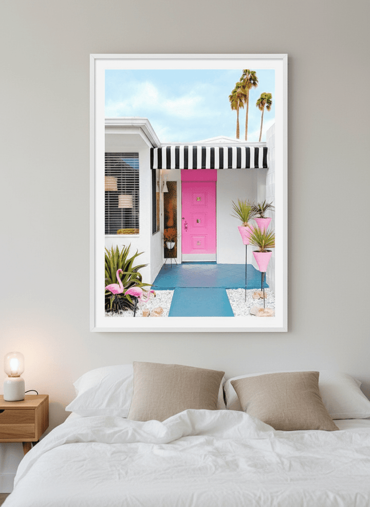 Minimalist artwork displayed in a calm, light-filled bedroom interior
