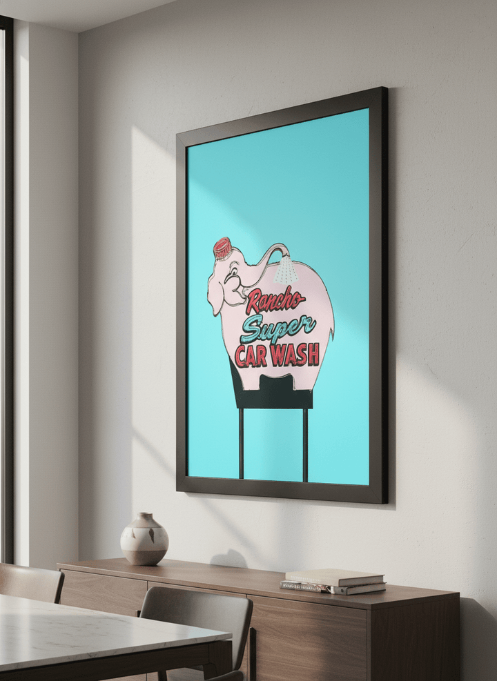 Wall art styled above a dining table in a contemporary home