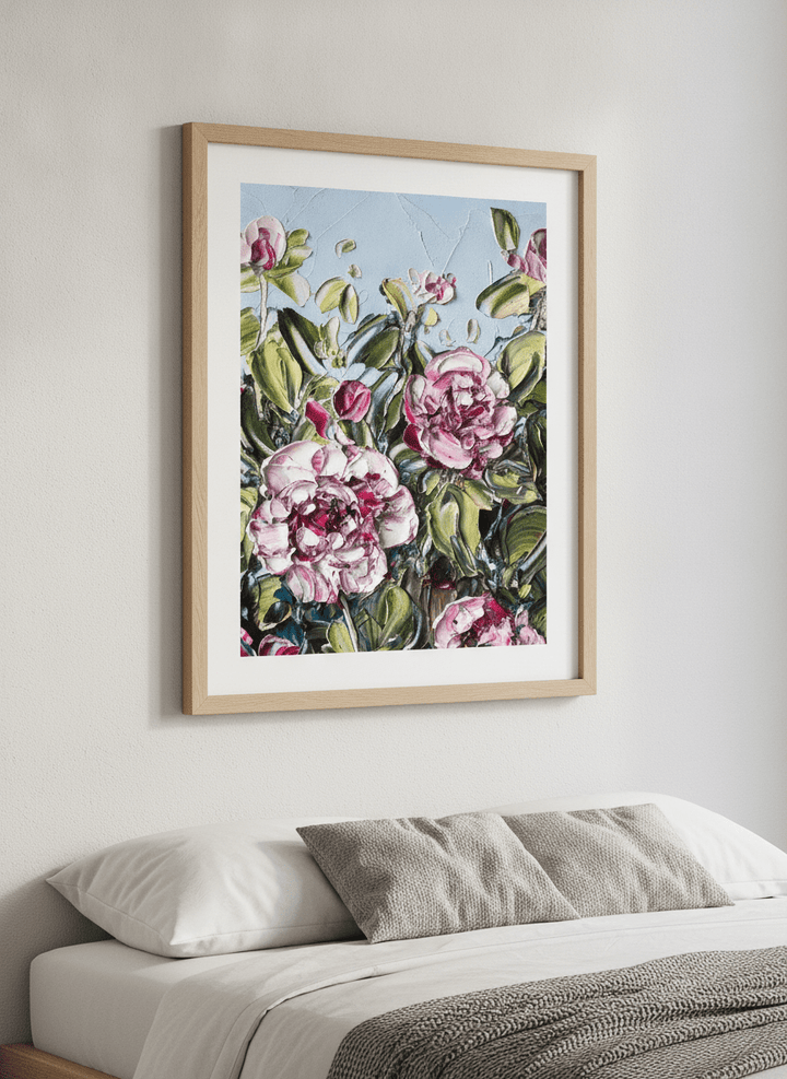 Minimalist artwork displayed in a calm, light-filled bedroom interior