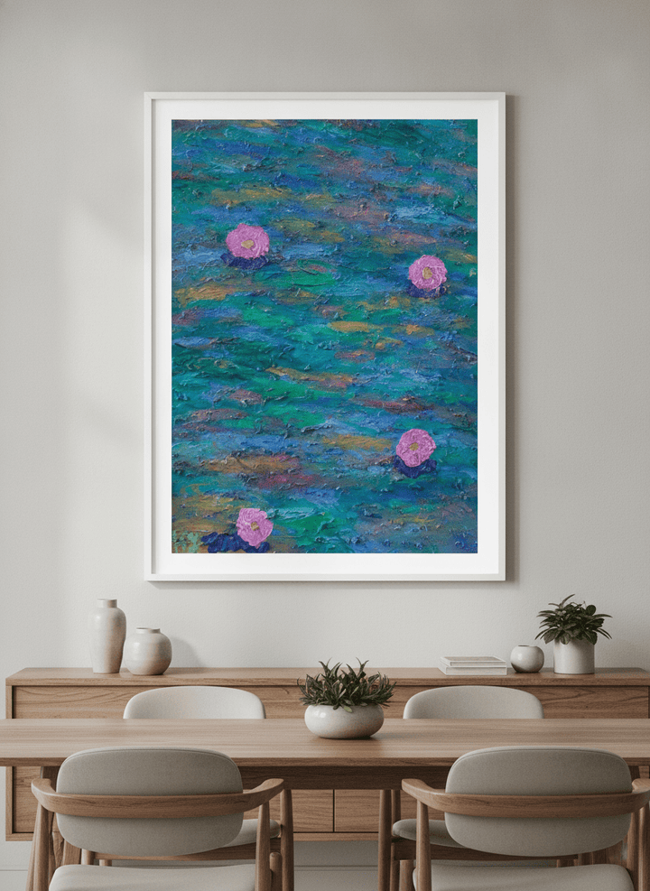 Wall art styled above a dining table in a contemporary home