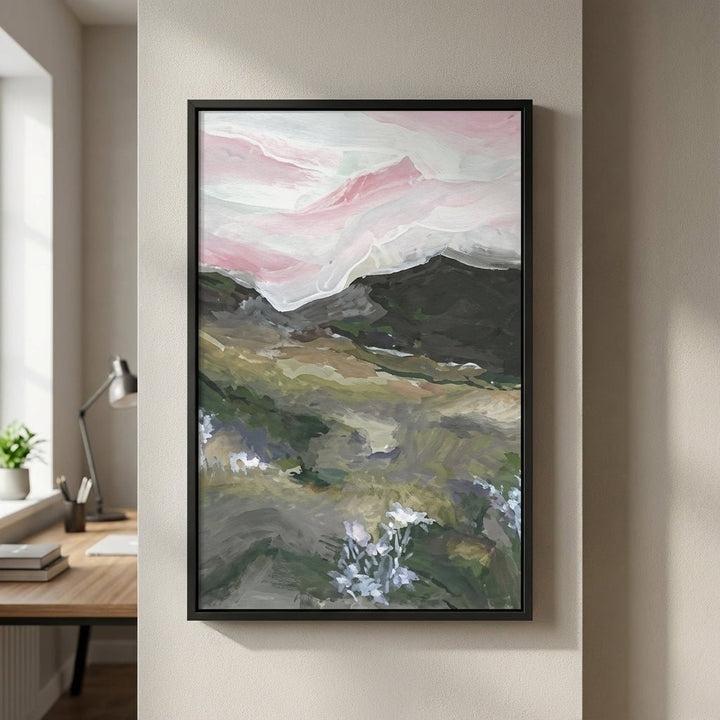 abstract painting on a wall in a room with a desk and lamp.