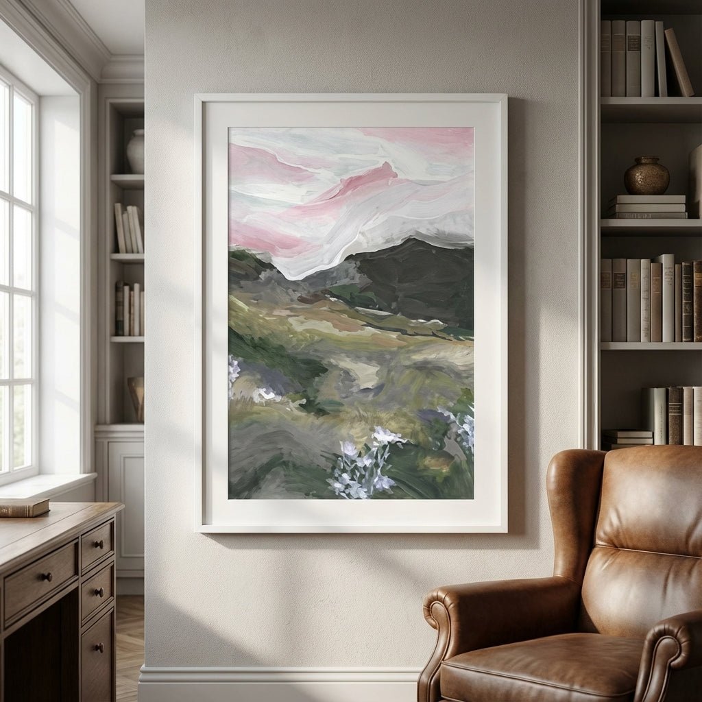 abstract painting on a wall above a brown leather armchair in a room with bookshelves.