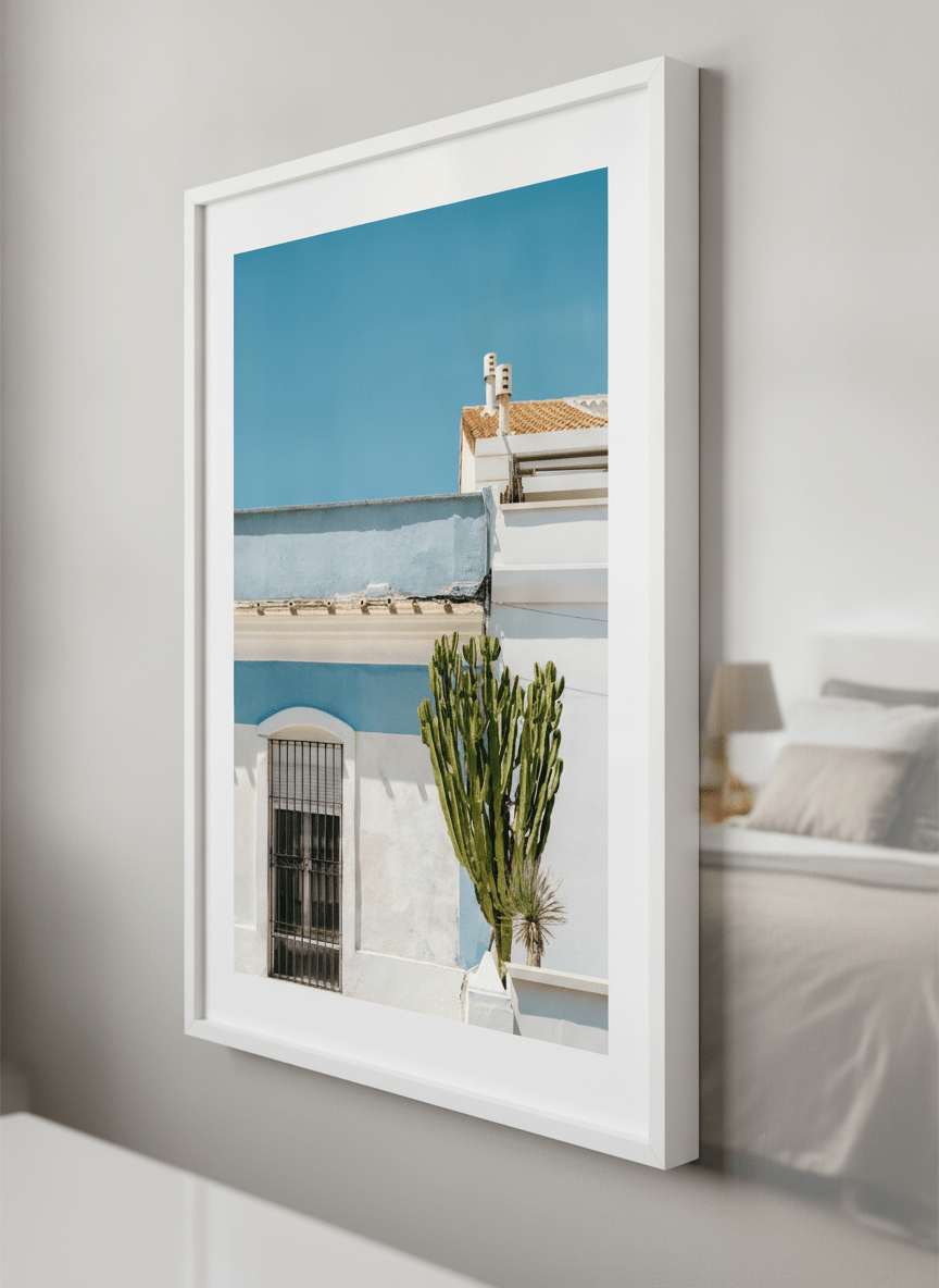 Minimalist artwork displayed in a calm, light-filled bedroom interior