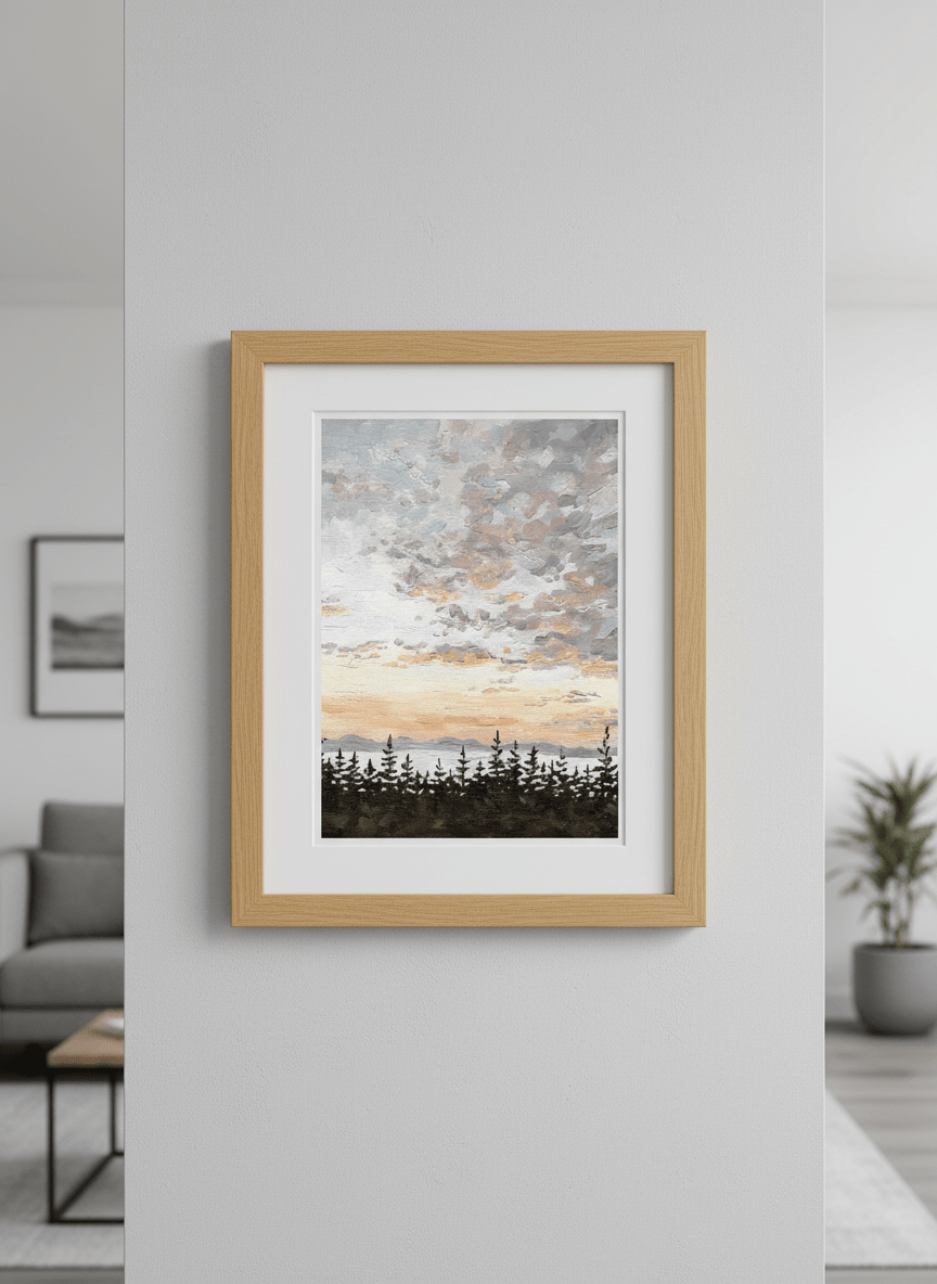 Modern wall art styled above a sofa in a neutral living room