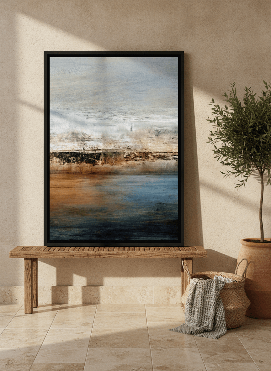 Canvas wall art with a black surround standing on a bench in a Mediterranean living room