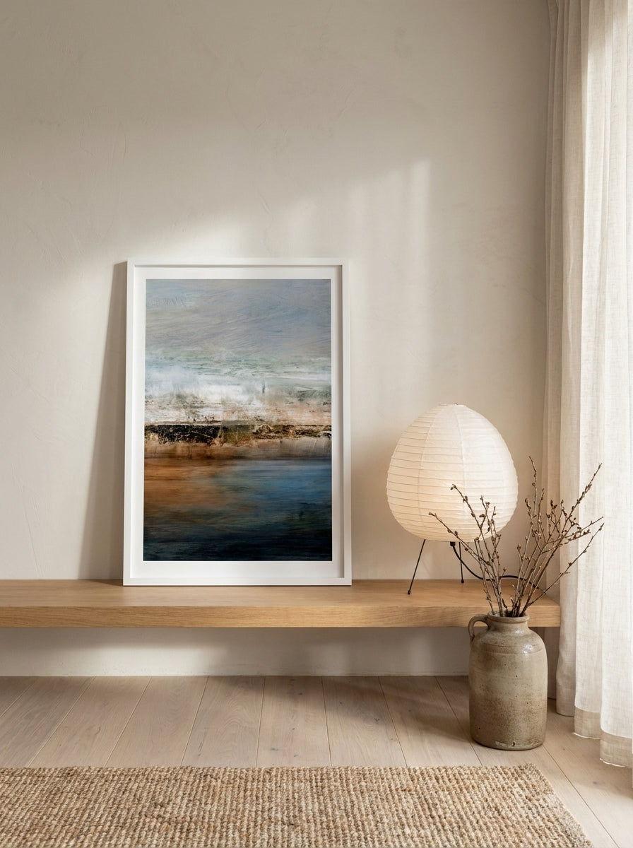 Modern wall art print standing on a shelf in a warm Japandi home office