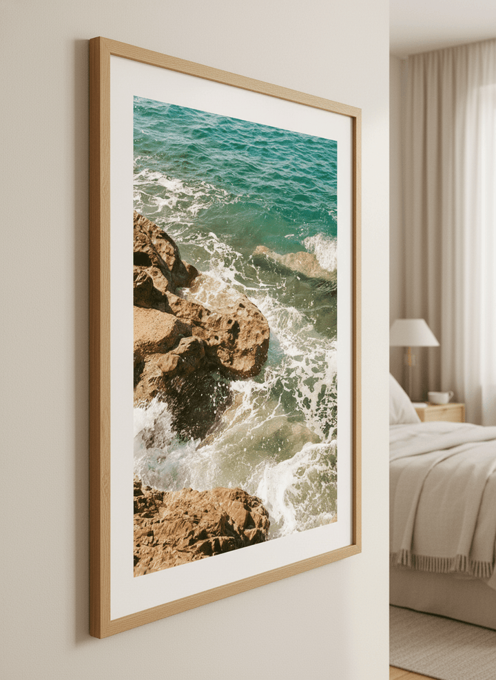 Minimalist artwork displayed in a calm, light-filled bedroom interior