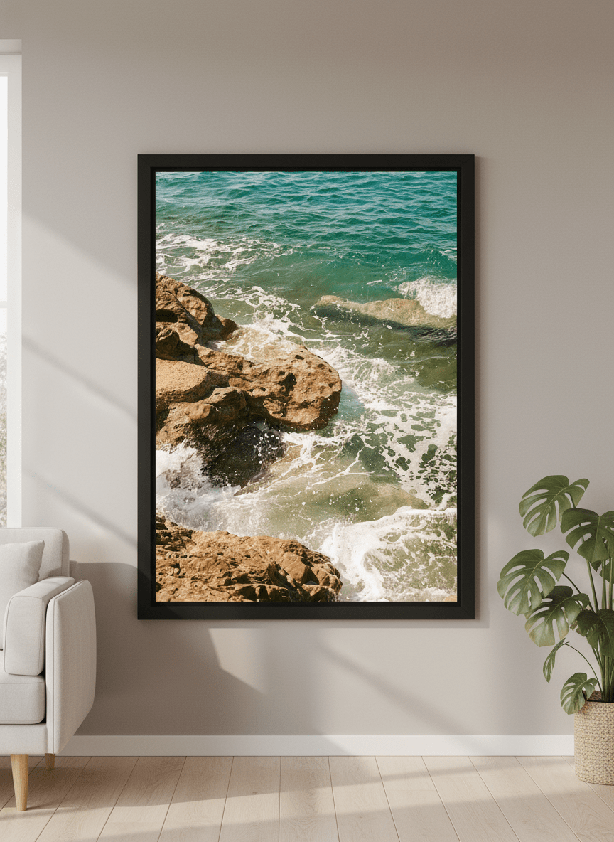 Modern wall art styled above a sofa in a neutral living room
