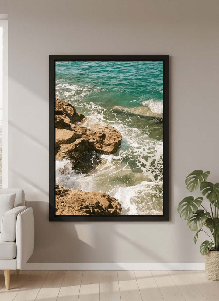 Modern wall art styled above a sofa in a neutral living room