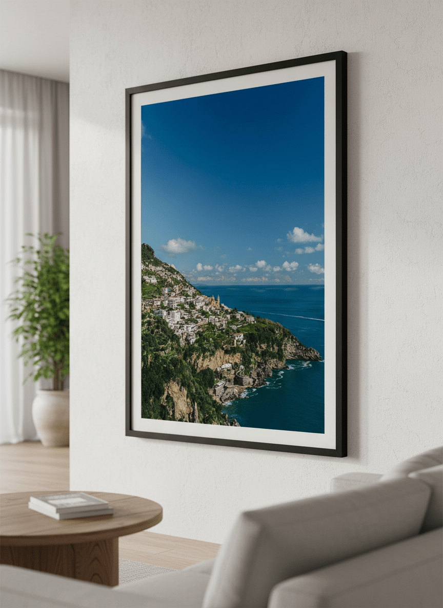Modern wall art styled above a sofa in a neutral living room