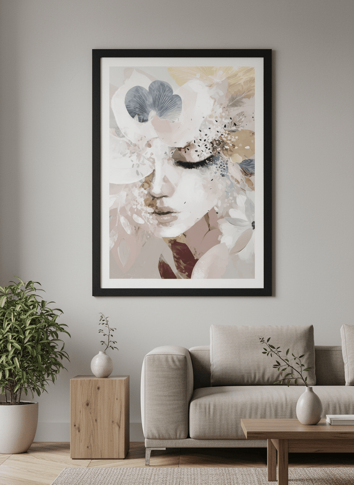 Modern wall art styled above a sofa in a neutral living room