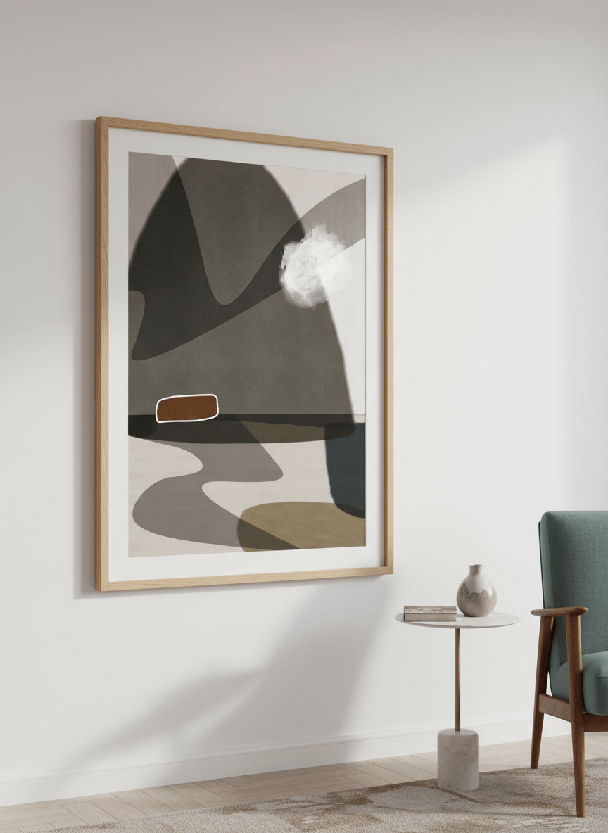 Modern wall art styled above a sofa in a neutral living room