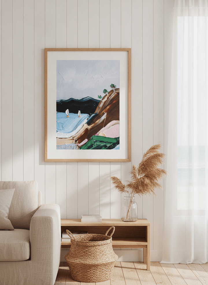 Neutral wall art displayed in a sunny coastal beach house
