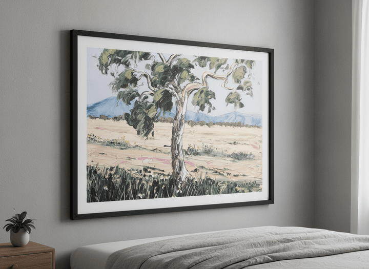 Minimalist artwork displayed in a calm, light-filled bedroom interior