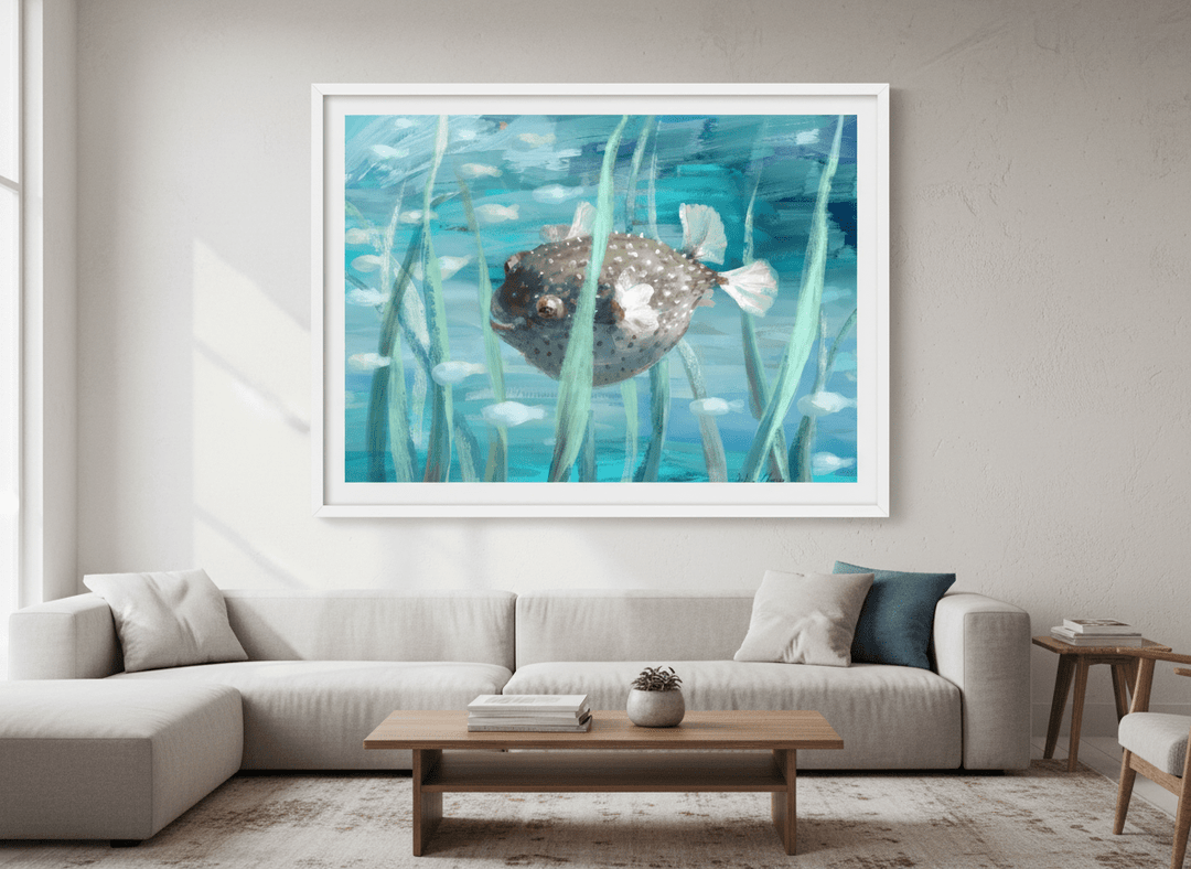 Modern wall art styled above a sofa in a neutral living room