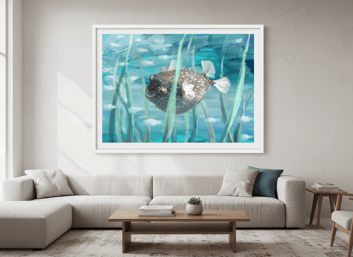 Modern wall art styled above a sofa in a neutral living room