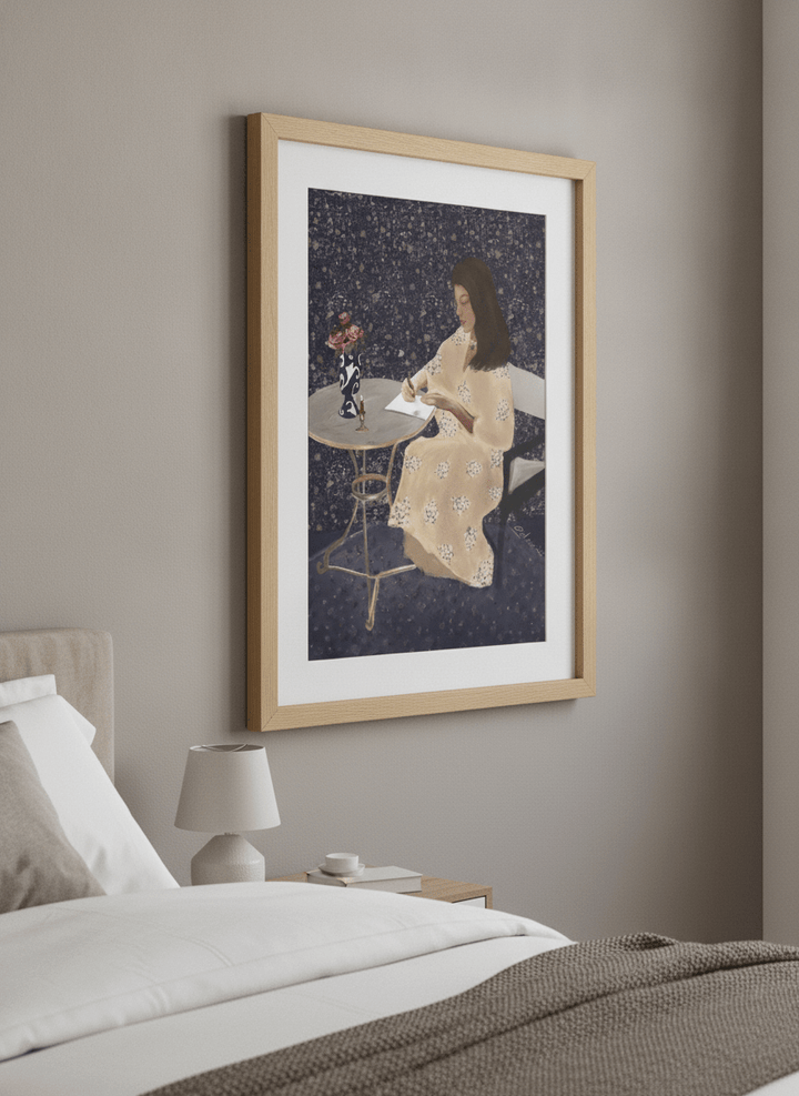 Minimalist artwork displayed in a calm, light-filled bedroom interior