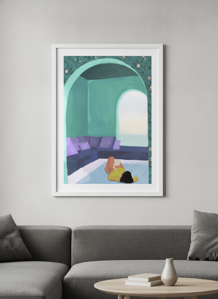 Modern wall art styled above a sofa in a neutral living room