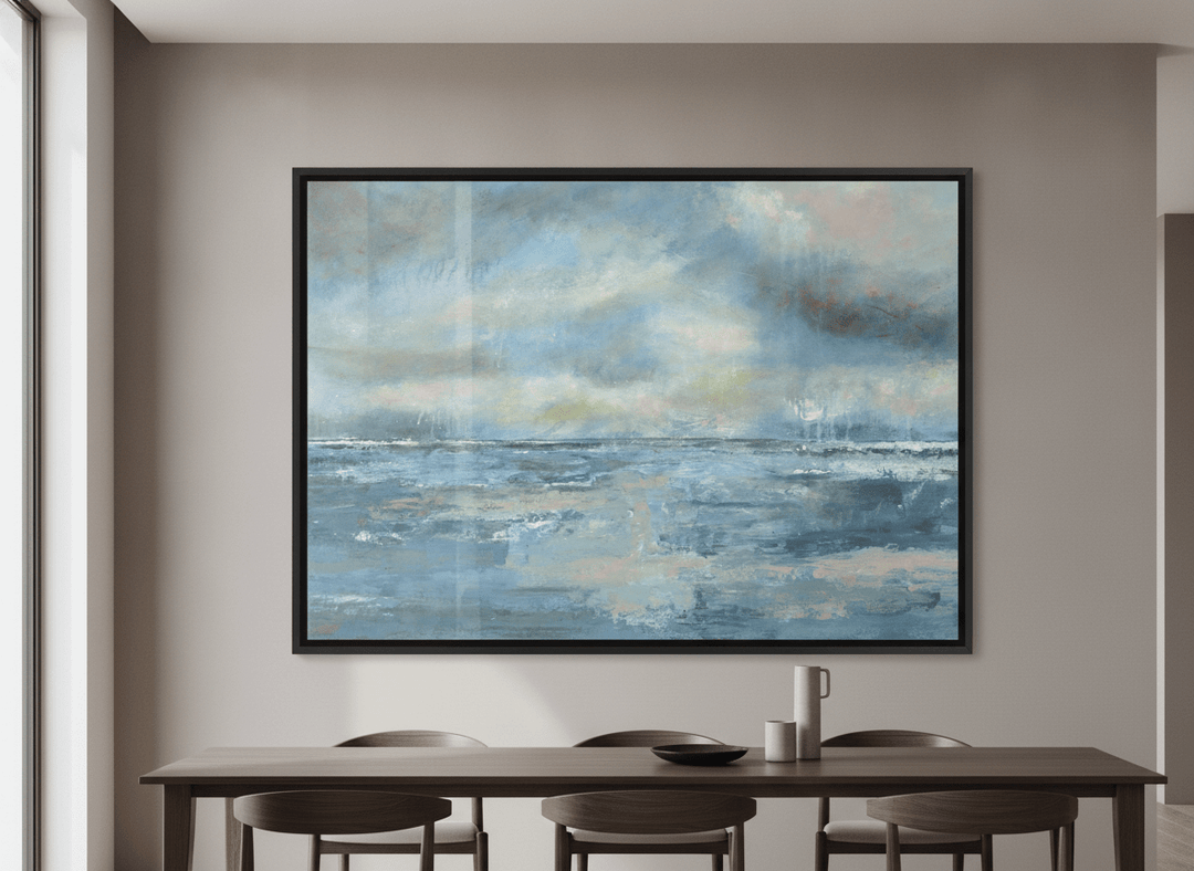 Wall art styled above a dining table in a contemporary home