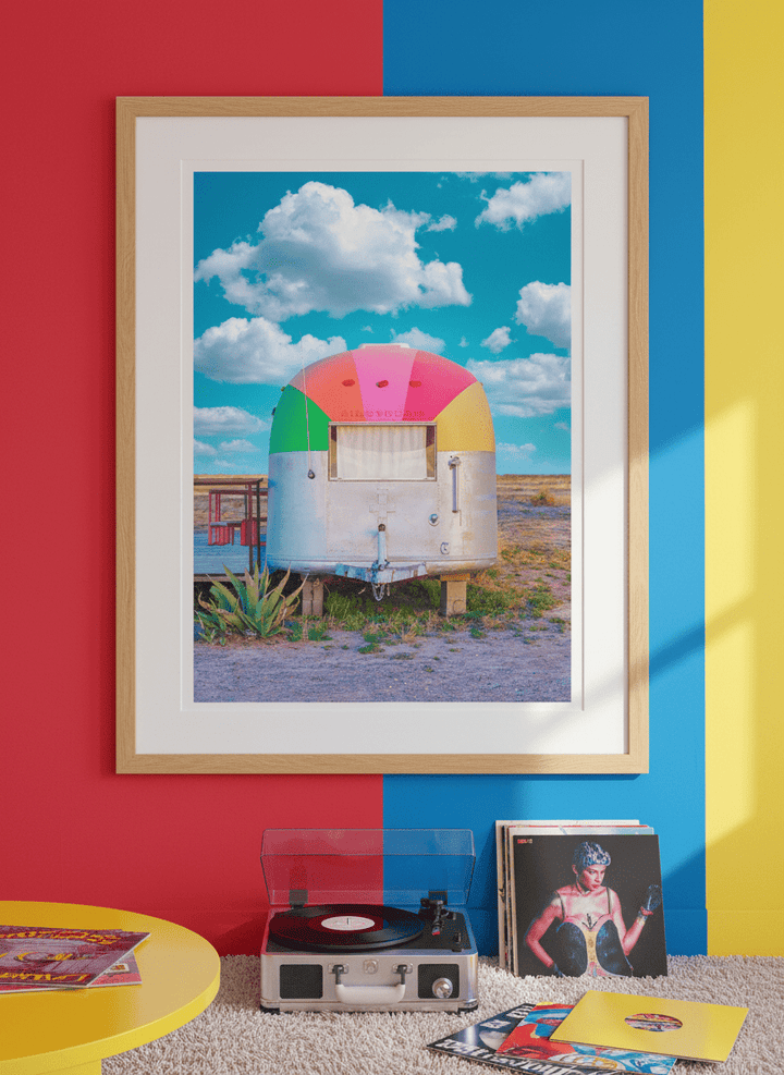 Bold wall art styled in a colourful, eclectic modern home