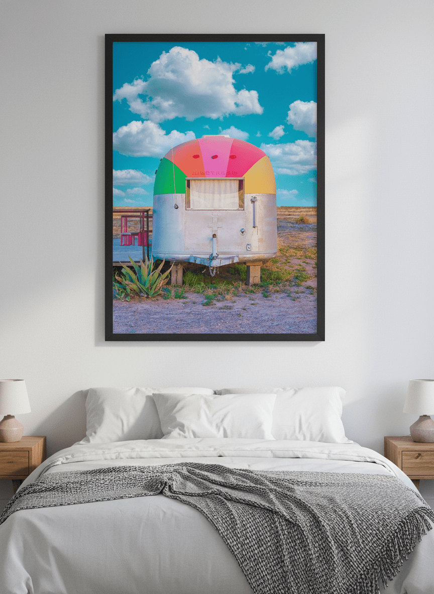 Minimalist artwork displayed in a calm, light-filled bedroom interior