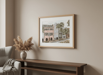 Modern wall art styled above a sofa in a neutral living room