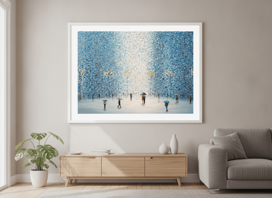 Modern wall art styled above a sofa in a neutral living room
