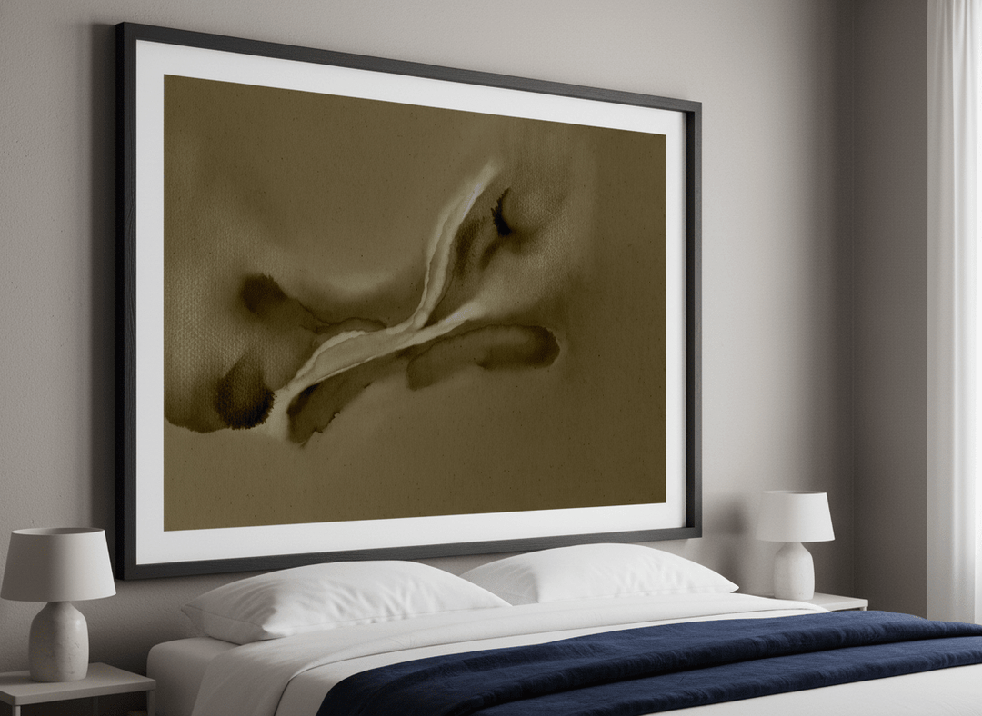 Minimalist artwork displayed in a calm, light-filled bedroom interior