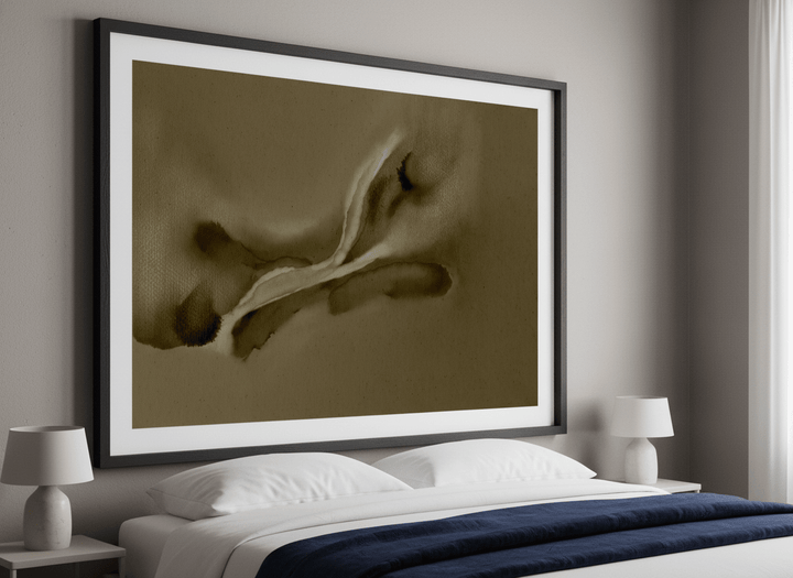 Minimalist artwork displayed in a calm, light-filled bedroom interior