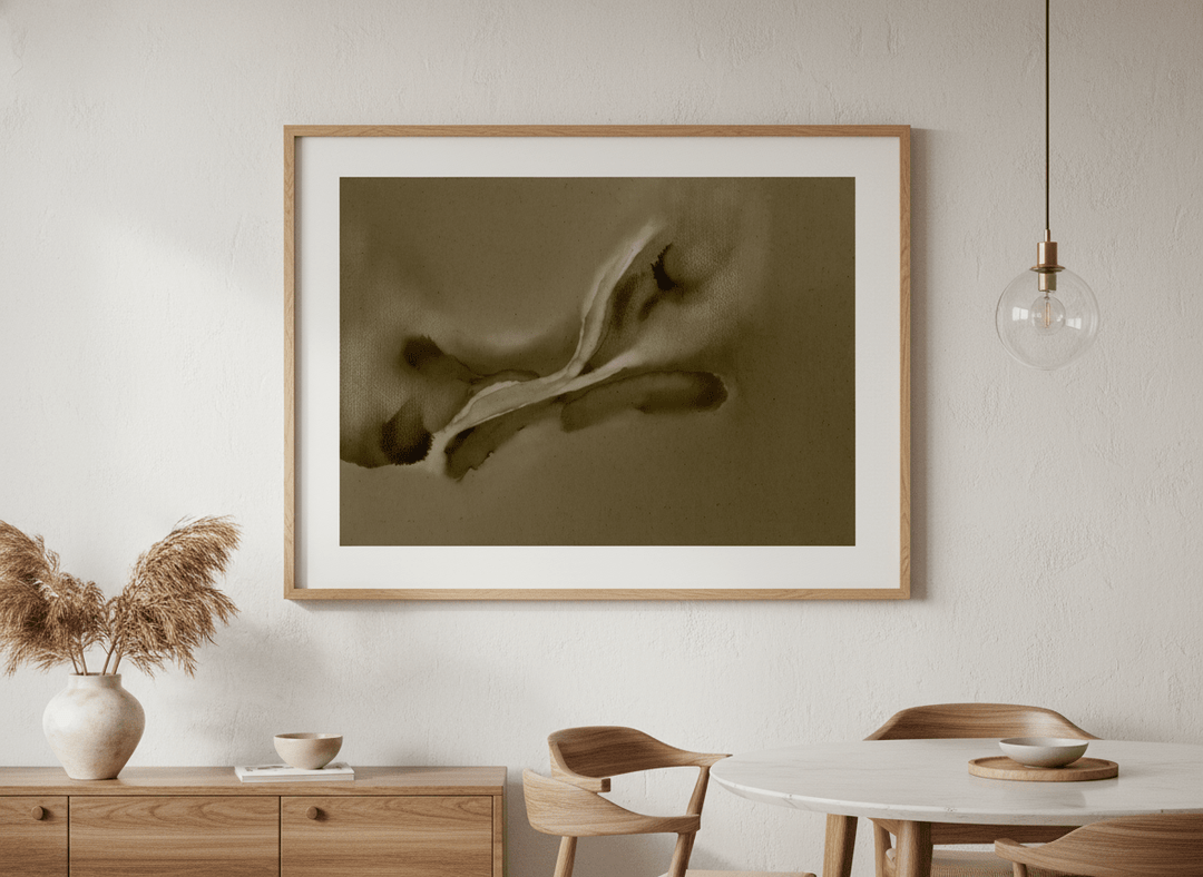 Wall art styled above a dining table in a contemporary home