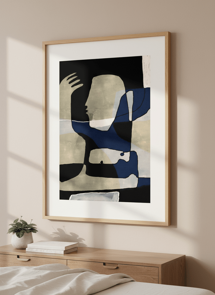 Minimalist artwork displayed in a calm, light-filled bedroom interior