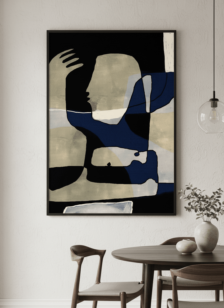 Wall art styled above a dining table in a contemporary home