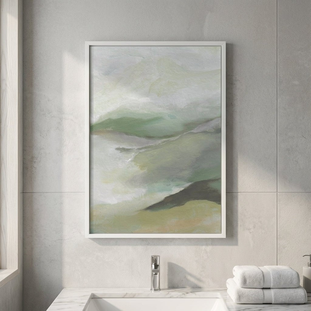 Abstract painting in a modern bathroom setting with a sink and towels.