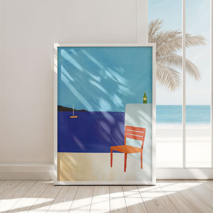 Artwork of a beach scene with a chair and palm tree, displayed in a room with a window.