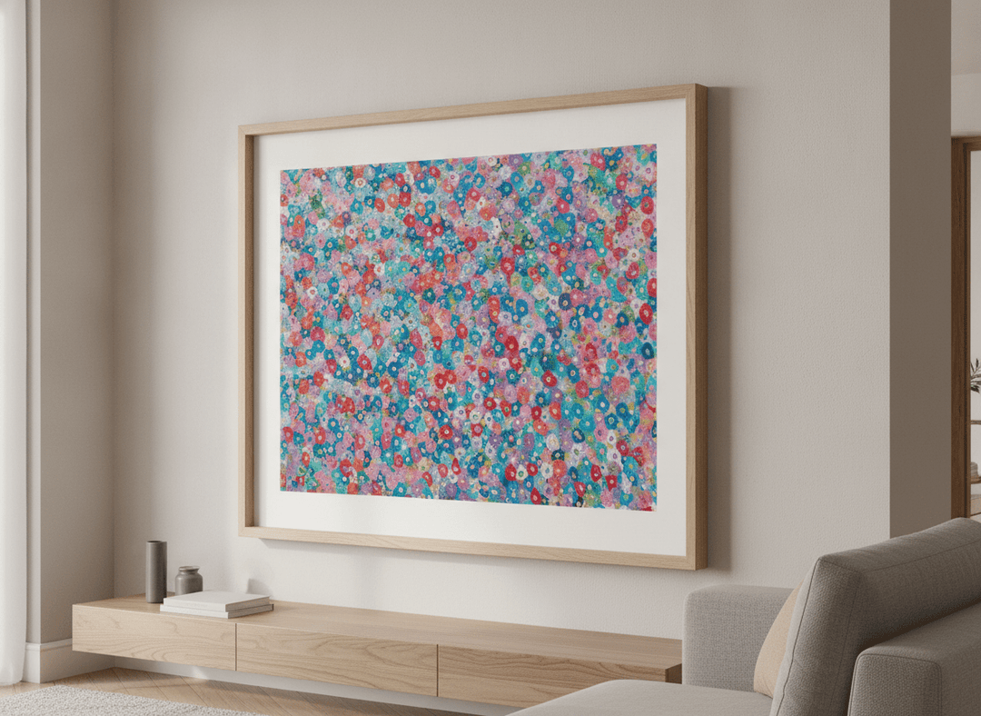Modern wall art styled above a sofa in a neutral living room