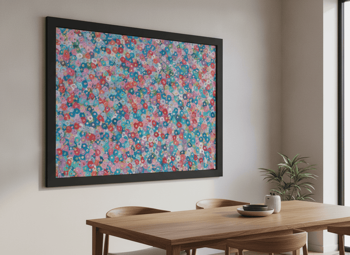 Wall art styled above a dining table in a contemporary home