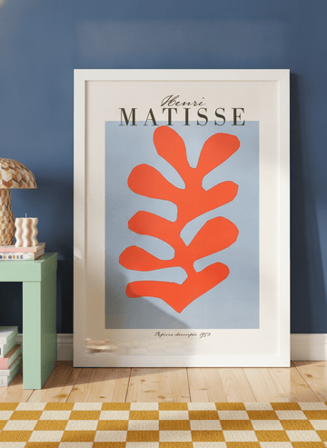 Modern wall art print standing on a side table in a colourful eclectic home office