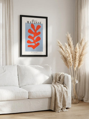 Modern wall art print styled on the wall in a coastal living room