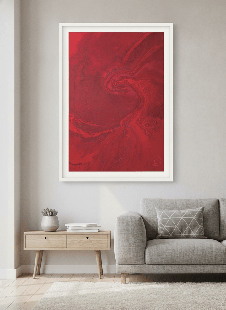 Modern wall art styled above a sofa in a neutral living room