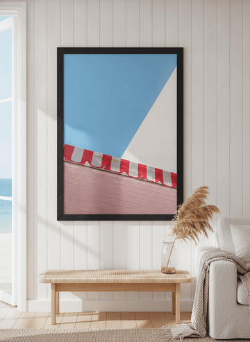 Neutral wall art displayed in a sunny coastal beach house