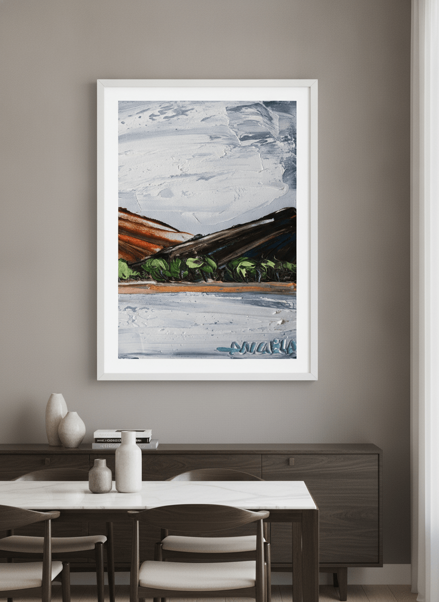 Wall art styled above a dining table in a contemporary home