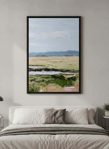 Minimalist artwork displayed in a calm, light-filled bedroom interior