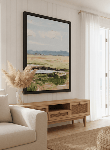 Neutral wall art displayed in a sunny coastal beach house