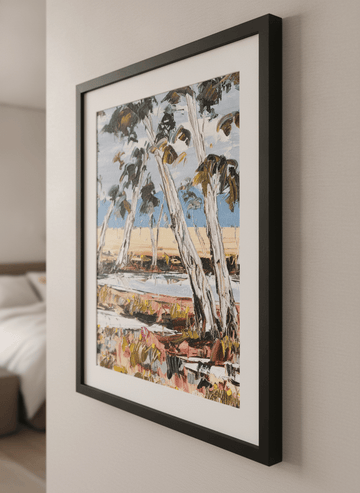 Minimalist artwork displayed in a calm, light-filled bedroom interior