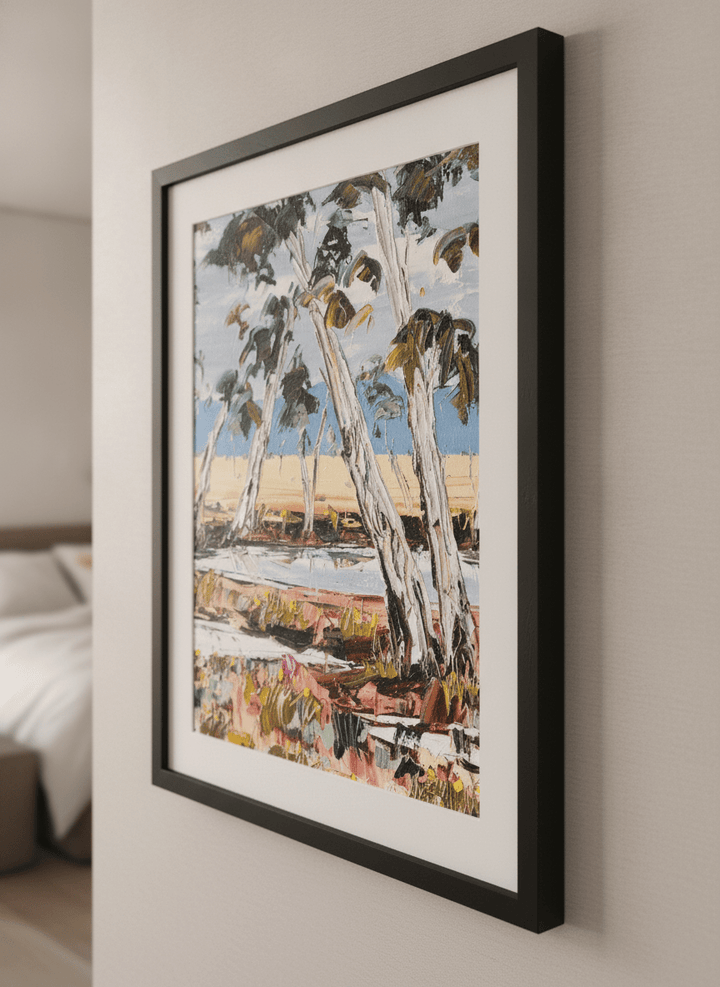 Minimalist artwork displayed in a calm, light-filled bedroom interior