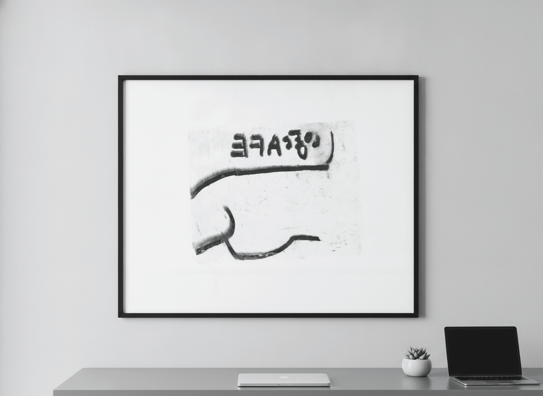 Contemporary wall art featured in a bright modern office workspace