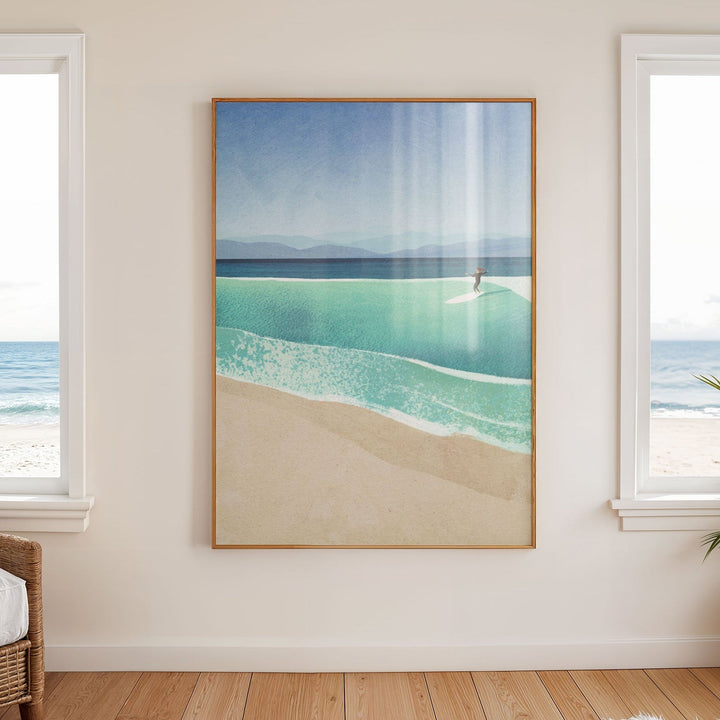 Beach scene print on a wall with windows and plant in the room.