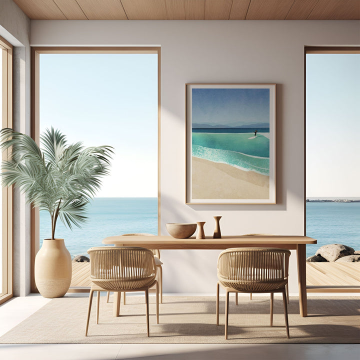 Modern dining room with ocean view through large windows, featuring a table and chairs.