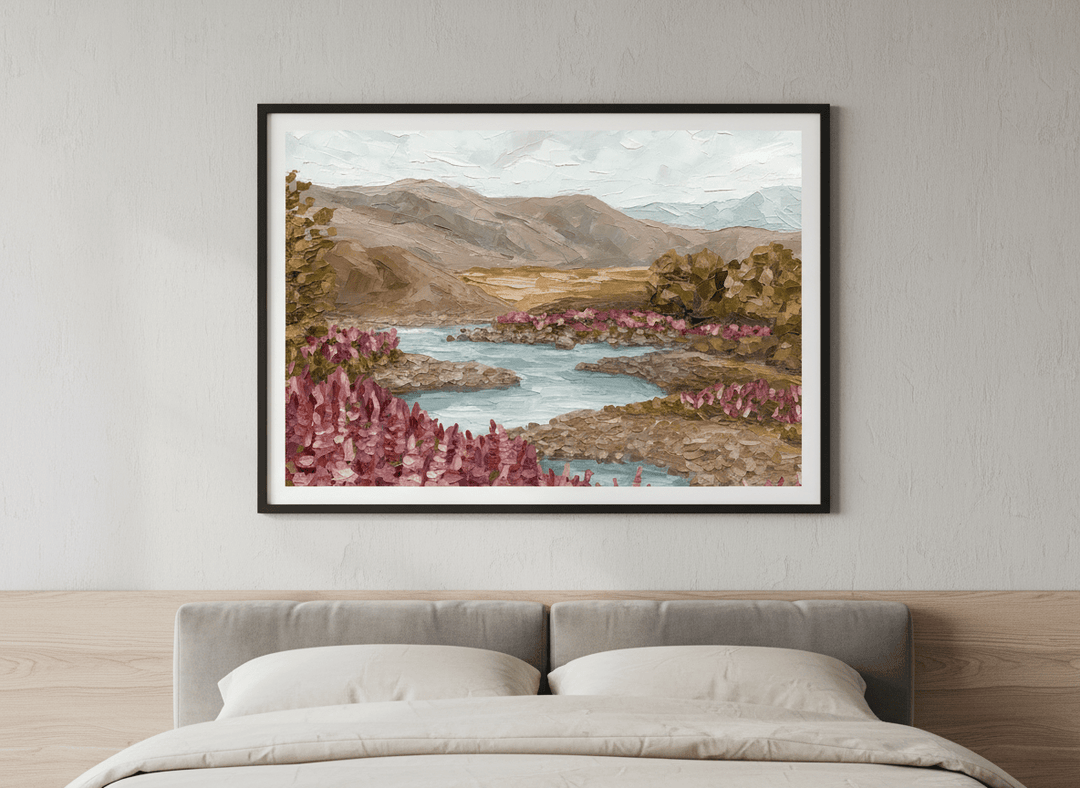Minimalist artwork displayed in a calm, light-filled bedroom interior